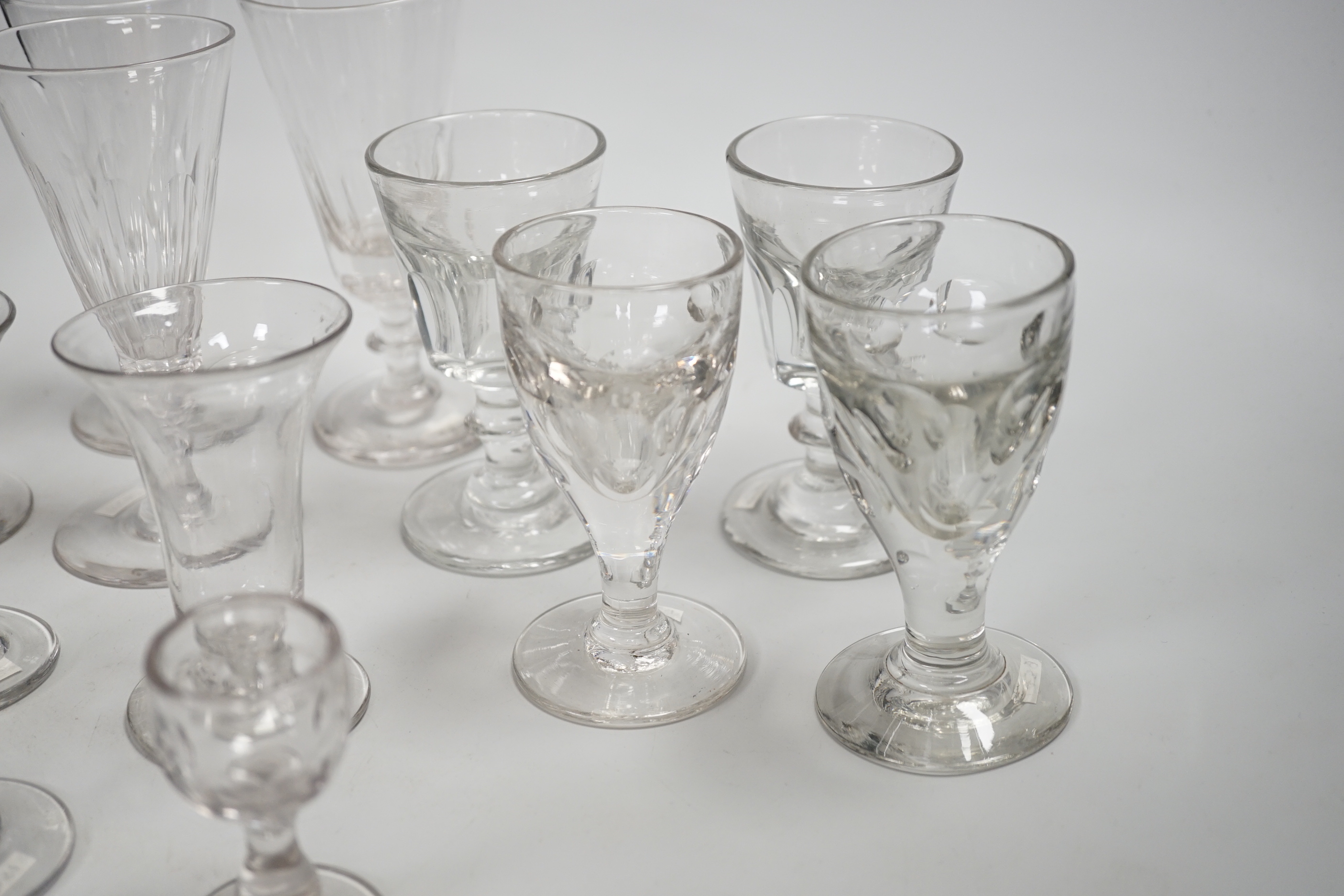 1429, 1430, 1451, 1439 & 1435 A harlequin set of five English lead crystal short ales, c.1820-30, decorated with cut rounded facets, two with blade and three with ball knops, height 14.2cm, together with three pairs of 1